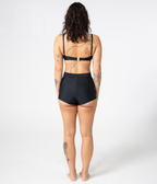 Burleigh Swim Shorts in Noir (black), back view on model