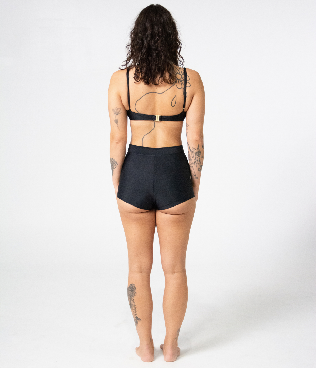 Burleigh Swim Shorts in Noir (black), back view on model