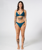Byron Low Rise Bottoms in Peacock (teal), front view on model