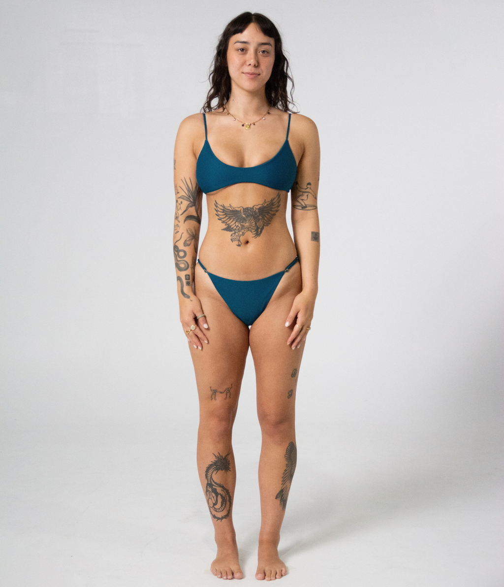 Crescent Scoop Top in Peacock (teal), front view on model showing the scoop neckline