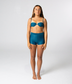 Wategos Underwire Top in Peacock (teal), front view on model with hands on thighs