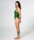 Mali One Piece in Fern (green), left side view on model