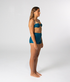 Wategos Underwire Top in Peacock (teal), right side view on model